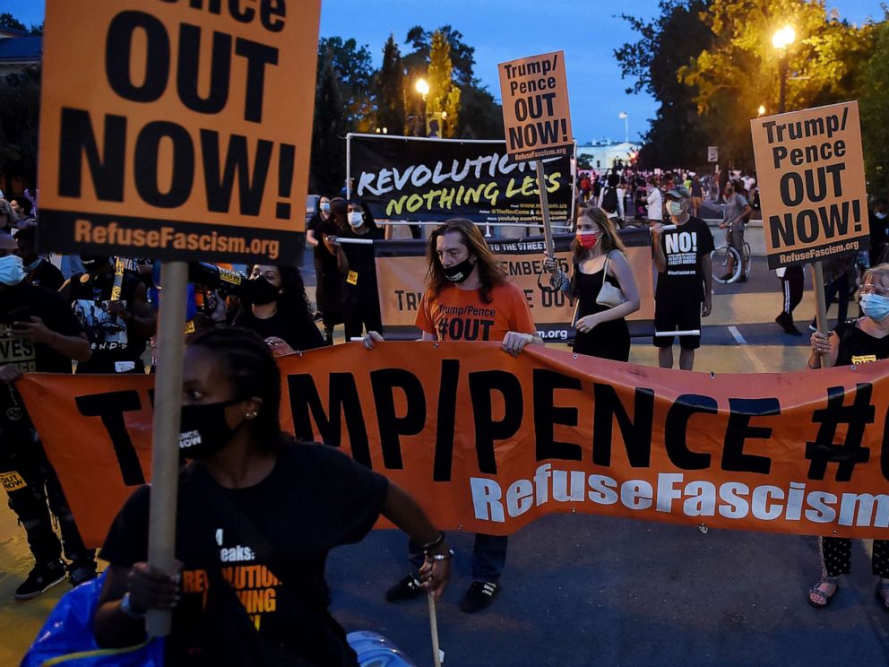 PHOTO: Demonstrators rally to protest President Donald Trump's acceptance of the Republican National Convention nomination at Black Lives Matter plaza across from the White House on Aug. 27, 2020, in Washington.