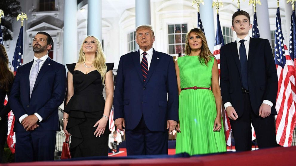 PHOTO: President Donald Trump and members of his family watch fireworks at the conclusion of the final day of the Republican National Convention from the South Lawn of the White House on Aug. 27, 2020, in Washington.
