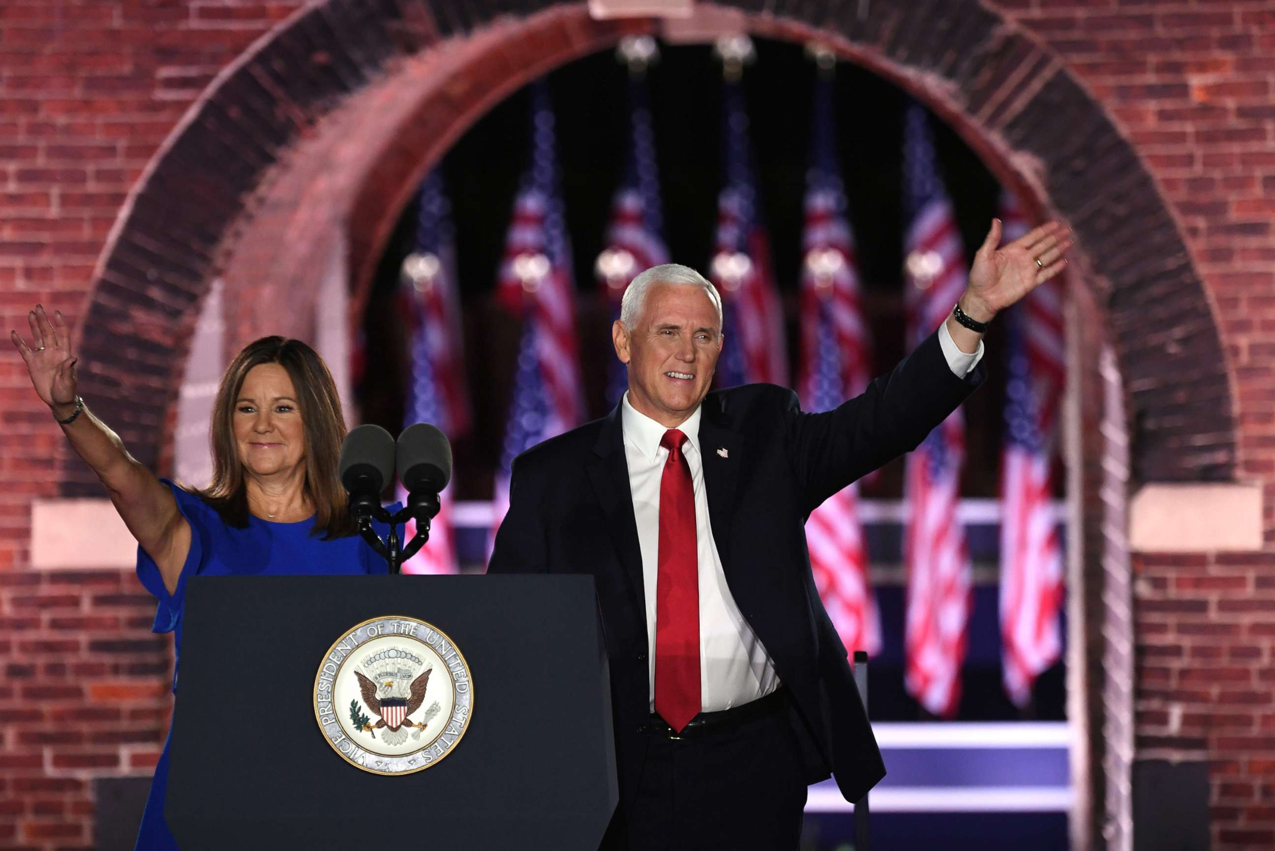 PHOTO: Vice President Mike Pence arrives with wife Karen Pence before speaking during the third night of the Republican National Convention at Fort McHenry National Monument in Baltimore, Aug. 26, 2020.