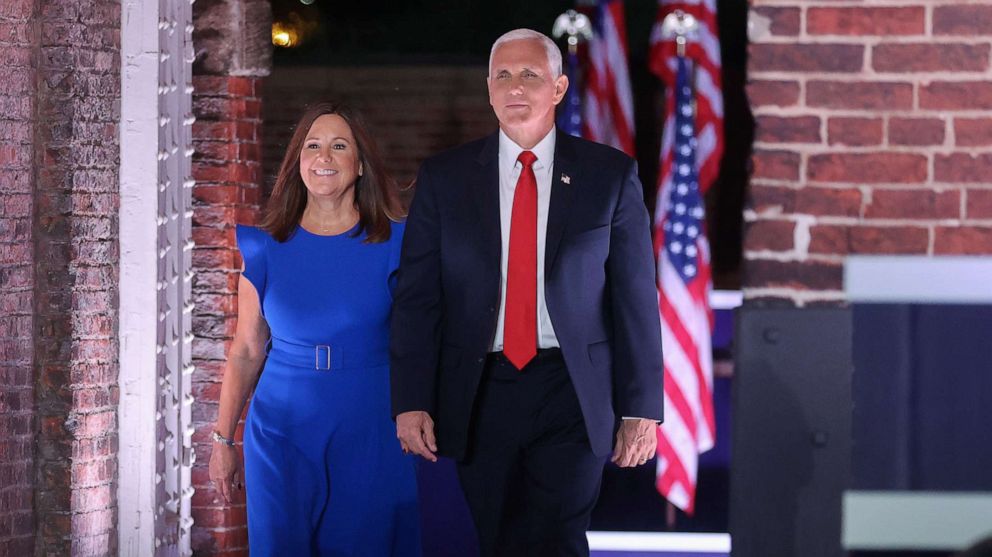 PHOTO: Vice President Mike Pence arrives with his wife Karen Pence to deliver his acceptance speech during an event of the 2020 Republican National Convention held at Fort McHenry in Baltimore, Aug. 26, 2020.