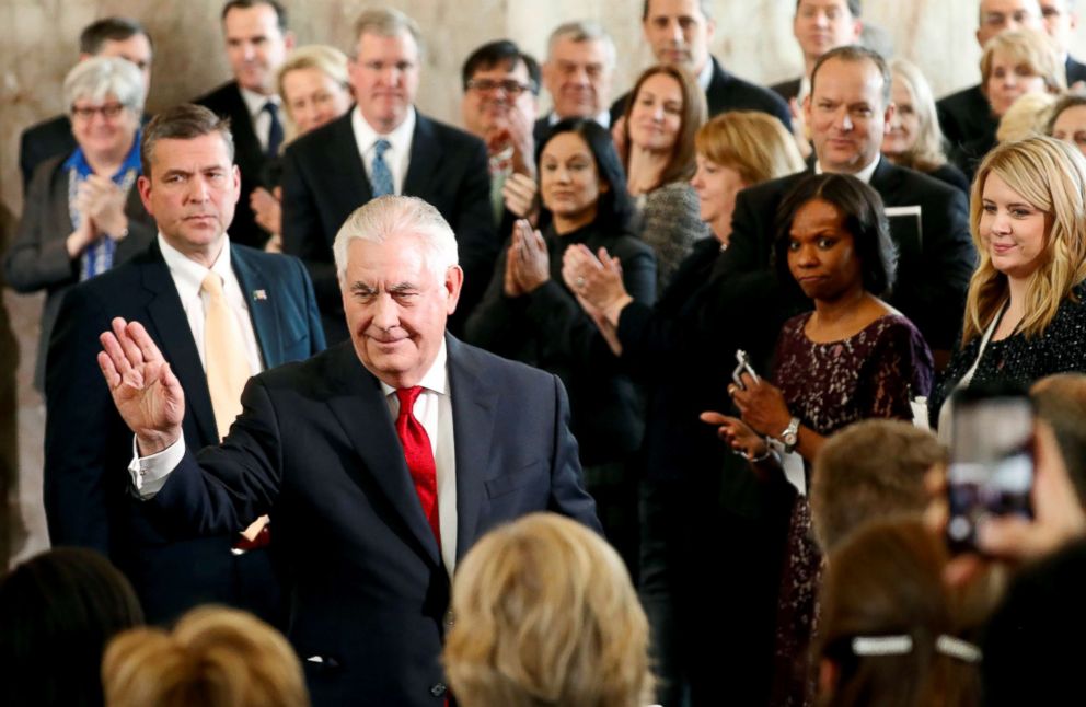 PHOTO: Outgoing U.S. Secretary of State Rex Tillerson waves to applauding State Department workers as he leaves the State Department for the last time in Washington, March 22, 2018. 