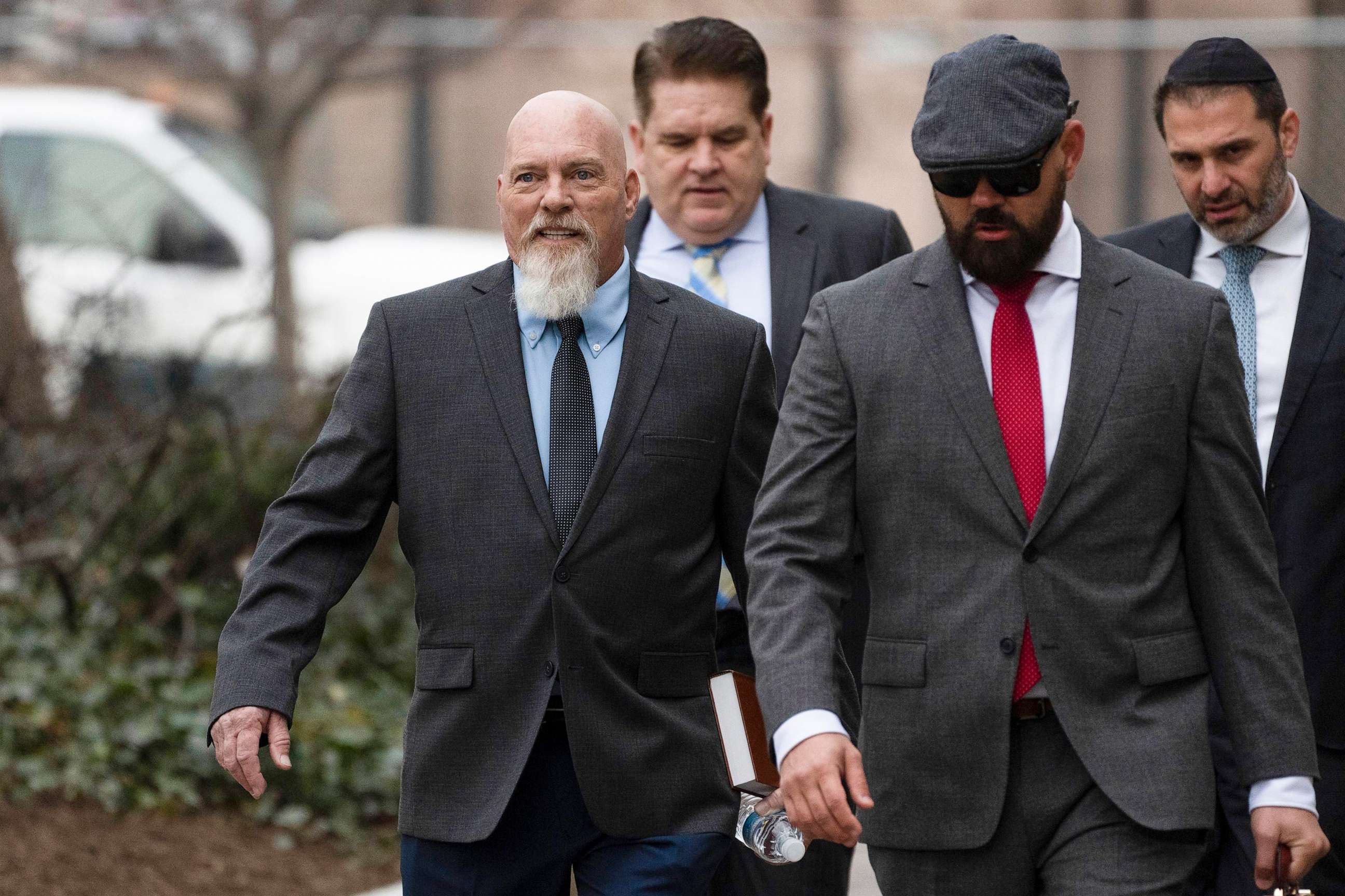 PHOTO: In this Jan. 10, 2023, file photo, Richard Barnett, left, an Arkansas man who was photographed with his feet on a desk in former House Speaker Nancy Pelosi's office during the Jan. 6 U.S. Capitol riot, arrives at federal court in Washington, D.C.,