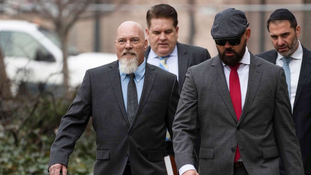 PHOTO: In this Jan. 10, 2023, file photo, Richard Barnett, left, an Arkansas man who was photographed with his feet on a desk in former House Speaker Nancy Pelosi's office during the Jan. 6 U.S. Capitol riot, arrives at federal court in Washington, D.C.,