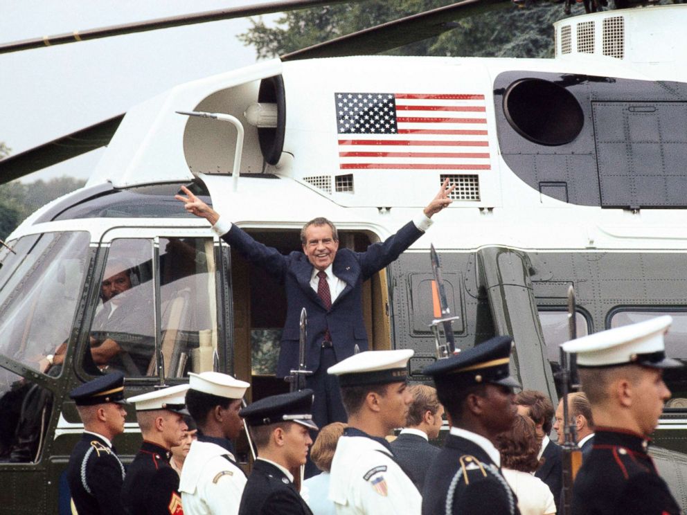 PHOTO: Richard Nixon smiles and gives the victory sign as he boards the White House helicopter after resigning the presidency, Aug. 9, 1974.