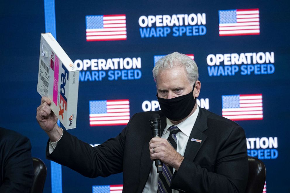 PHOTO: Richard Smith, president of the Americas at Fedex Corp., holds a shipping box as he speaks during an Operation Warp Speed vaccine summit at the White House in Washington, D.C., Dec. 8, 2020.