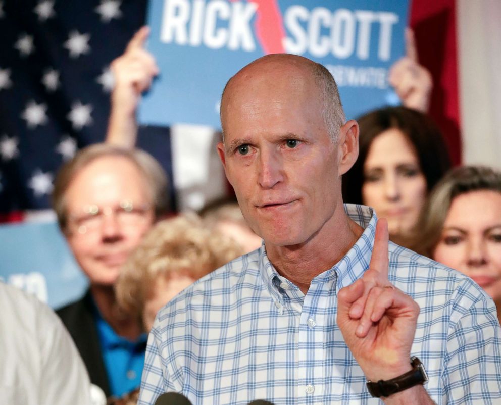 PHOTO: Florida Governor Rick Scott meets with fans at a Republican rally in Orlando, Florida on September 6, 2018.