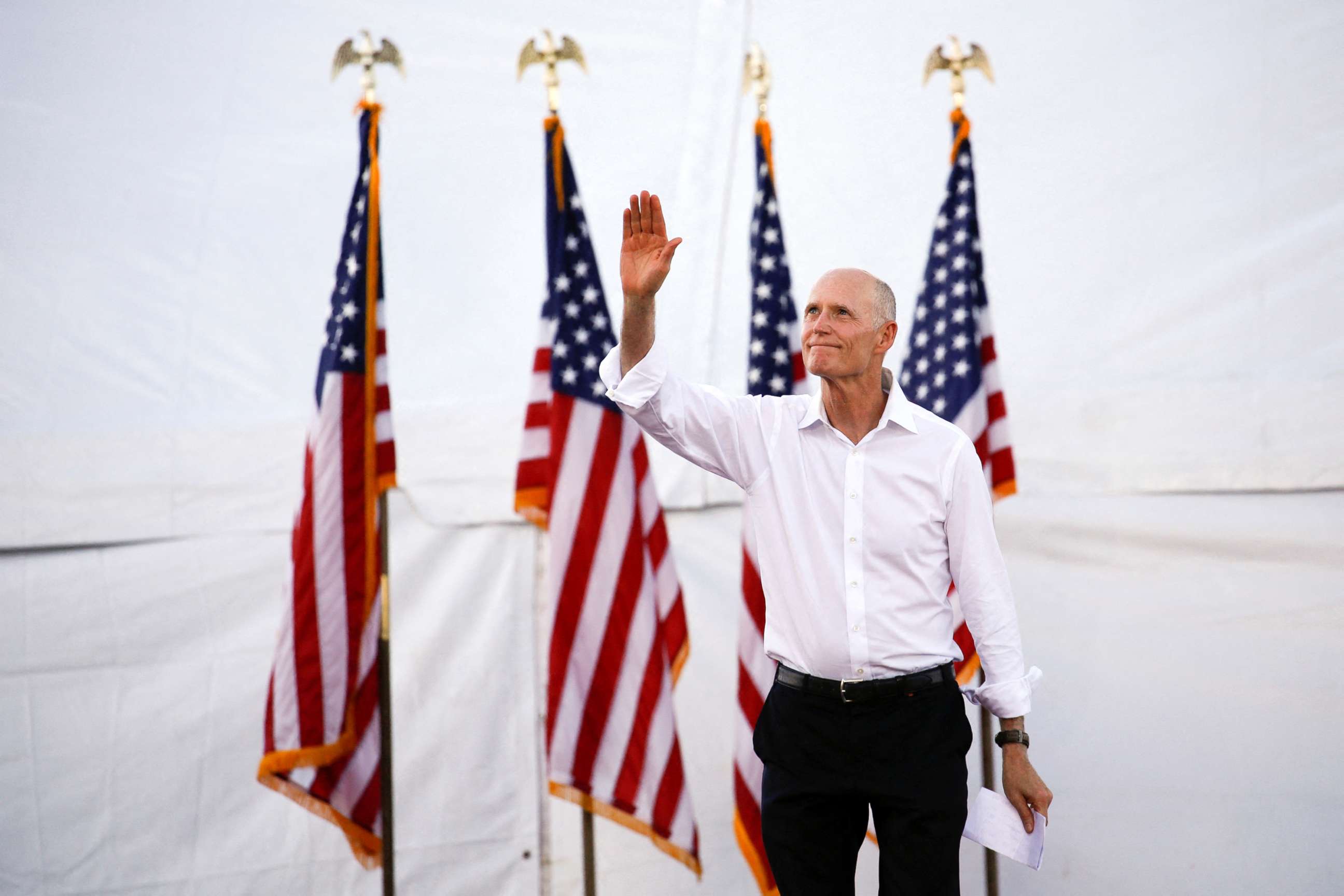 PHOTO: National Republican Senatorial Committee Chairman Senator Rick Scott takes the stage during a rally with Former President Donald Trump ahead of the midterm elections, in Miami, Fla., on Nov. 6, 2022.