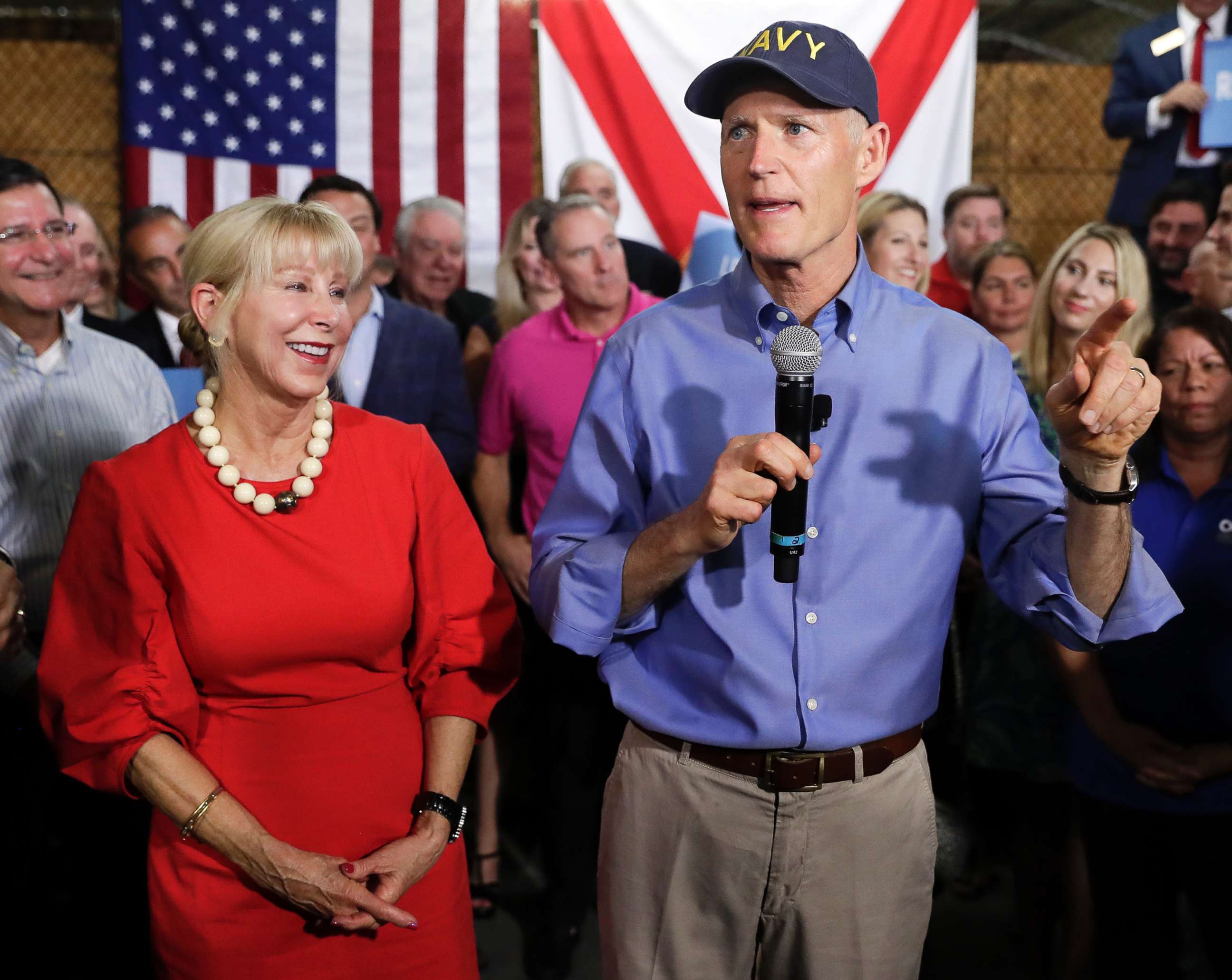 PHOTO: Florida Gov. Rick Scott, with his wife Ann, left, announces his bid to run for the U.S. Senate at a news conference, April 9, 2018, in Orlando, Fla.