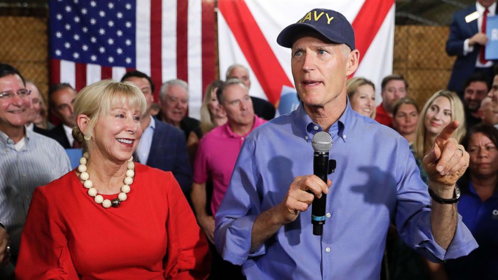 PHOTO: Florida Gov. Rick Scott, with his wife Ann, left, announces his bid to run for the U.S. Senate at a news conference, April 9, 2018, in Orlando, Fla.