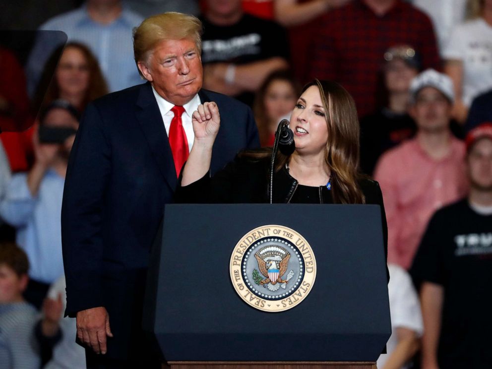 PHOTO: President Donald Trump listens as Chair of the Republican National Committee, Ronna McDaniel, right, speaks during a campaign rally, Nov. 5, 2018, in Cape Girardeau, Mo.