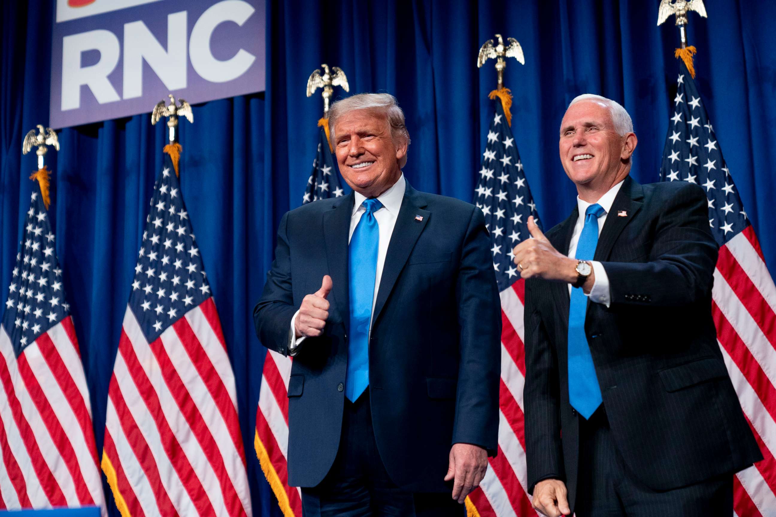 PHOTO: President Donald Trump and Vice President Mike Pence stand on stage during the first day of the 2020 Republican National Convention in Charlotte, N.C., Aug. 24, 2020.
