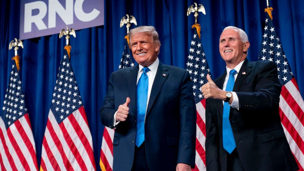 PHOTO: President Donald Trump and Vice President Mike Pence stand on stage during the first day of the 2020 Republican National Convention in Charlotte, N.C., Aug. 24, 2020.
