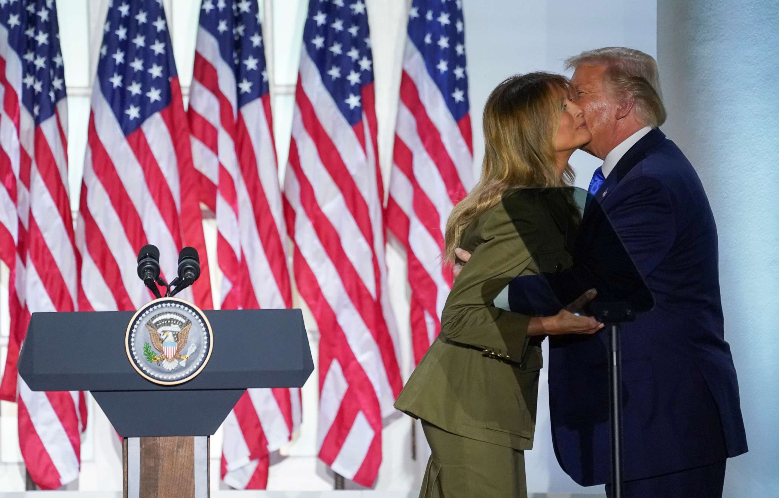 PHOTO: First lady Melania Trump is kissed by President Donald Trump after delivering her live address to the 2020 Republican National Convention from the Rose Garden of the White House in Washington, Aug. 25, 2020.