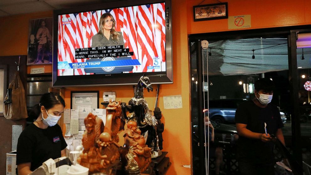 PHOTO: First lady Melania Trump is shown on a TV in a Thai restaurant as she speaks from the White house during the second night of the 2020 Republican National Convention, Aug. 25, 2020, in Los Angeles.