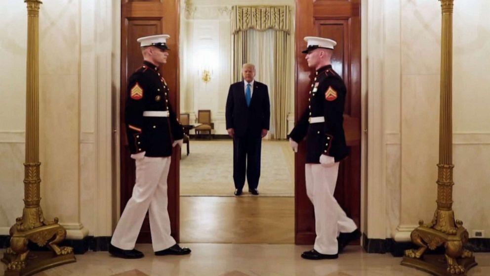 PHOTO: President Donald Trump is announced as he enters a room in the White House during video aired in the second night of the 2020 Republican National Convention, Aug. 25, 2020.