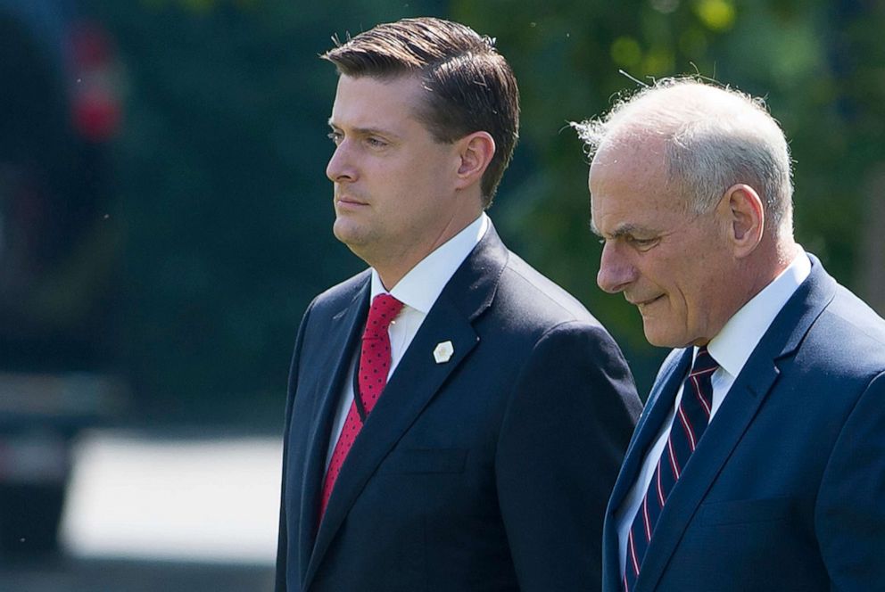 PHOTO: In this August 4, 2017, file photo, White House Chief of Staff John Kelly (R) and White House Staff Secretary Rob Porter (L) walk to Marine One prior to departure from the South Lawn of the White House in Washington, D.C.