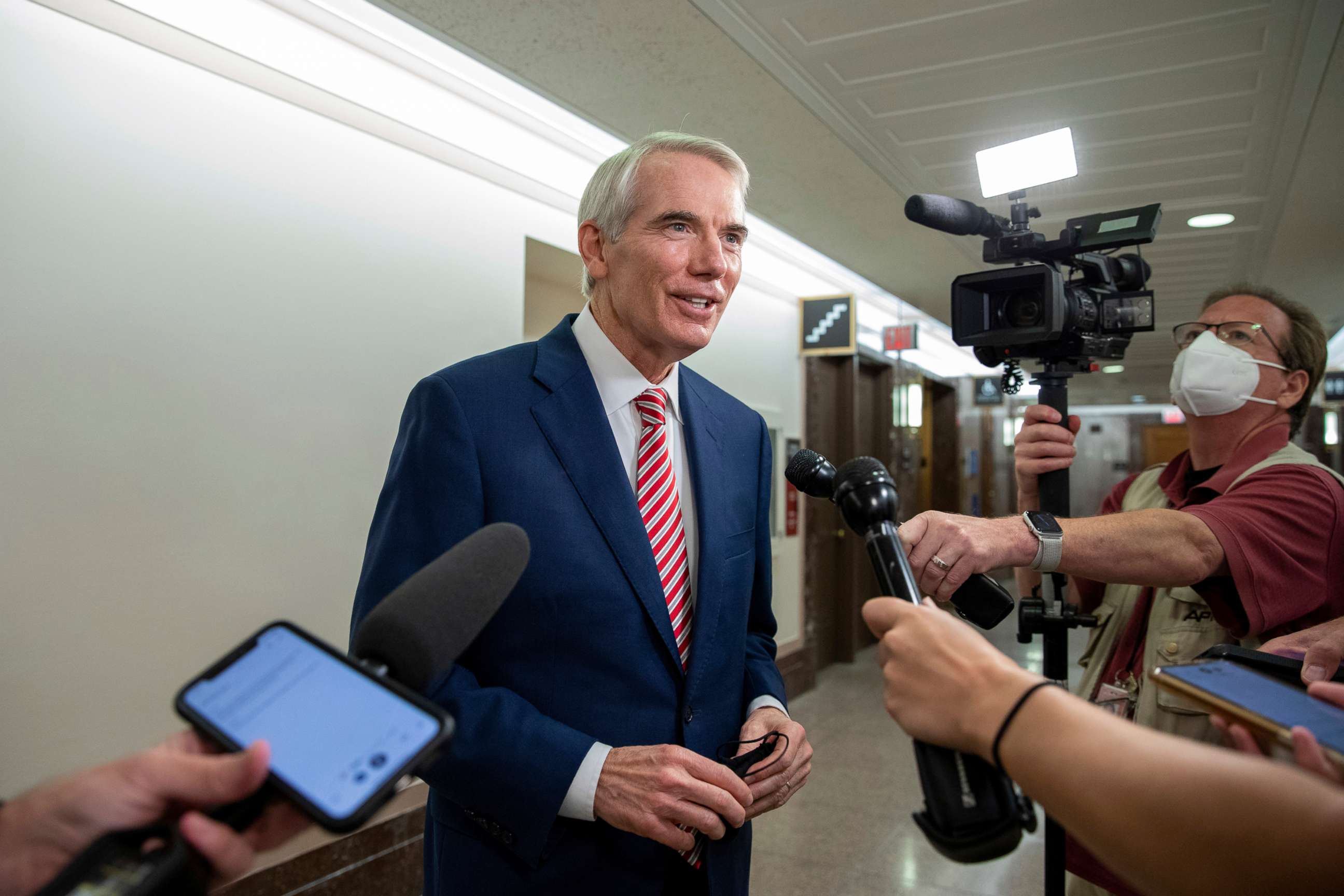 PHOTO: Sen. Rob Portman speaks to members of the media as lawmakers work to advance the $1 trillion bipartisan infrastructure bill at the Capitol in Washington, D.C., Aug. 5, 2021.