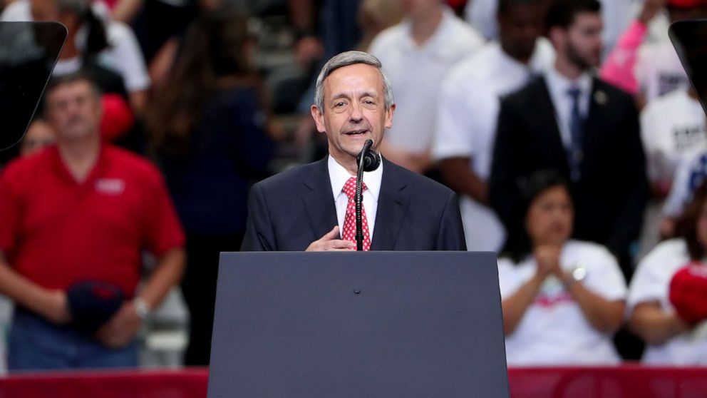 PHOTO: Pastor Robert Jeffress leads the pledge of allegiance before President Donald Trump speaks during a "Keep America Great" campaign rally at American Airlines Center, Oct. 17, 2019, in Dallas, Texas.