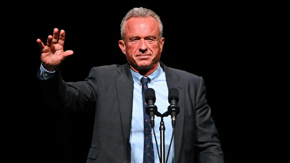 PHOTO: Robert F. Kennedy Jr. speaks ahead of a live interview with commentator Tucker Carlson and Republican presidential candidate Donald Trump, during the finale of the Tucker Carlson Live Tour in Glendale, Arizona, Oct. 31, 2024.