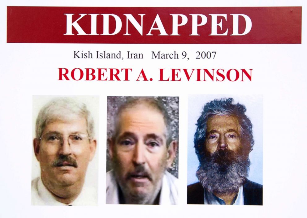  An FBI poster showing a composite image of retired FBI agent Robert Levinson, right, of how he would look like now after five years in captivity, and an image, center, taken from the video, released by his kidnappers, and a picture before he was kidnapped, left, displayed during a news conference in Washington, March 6, 2012.
					