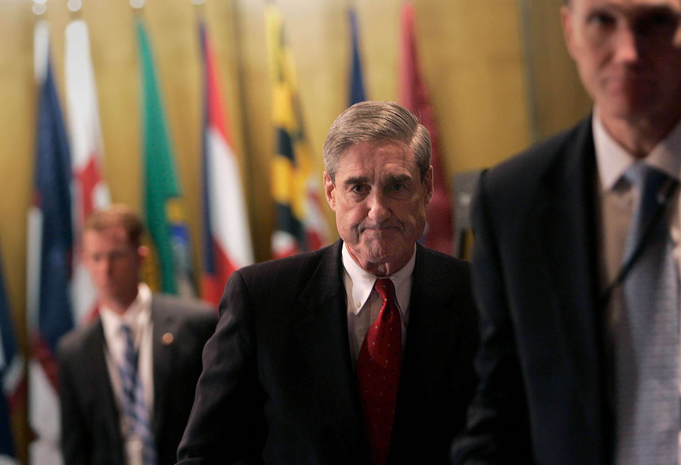PHOTO: FBI Director Robert Mueller leaves a news conference at FBI headquarters in Washington, March 9, 2007.