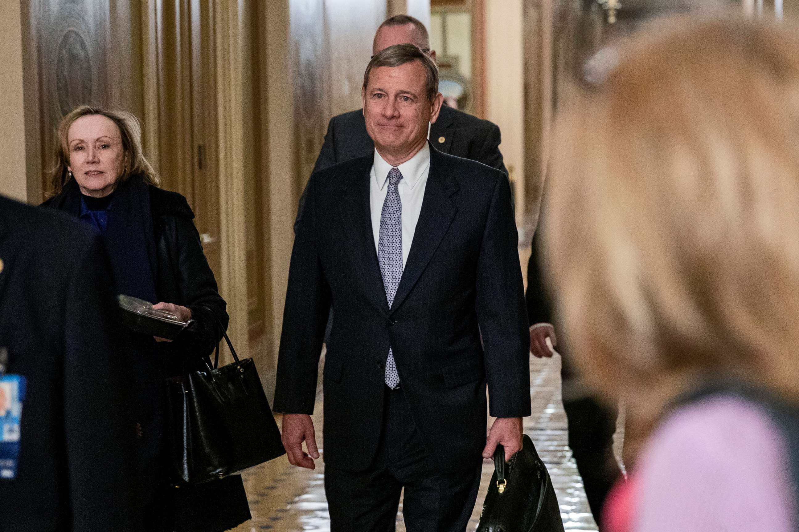 PHOTO: Supreme Court Chief Justice John Roberts leaves the Capitol building after the Senate impeachment trial of President Donald Trump was adjourned for the day, Jan. 27, 2020. 