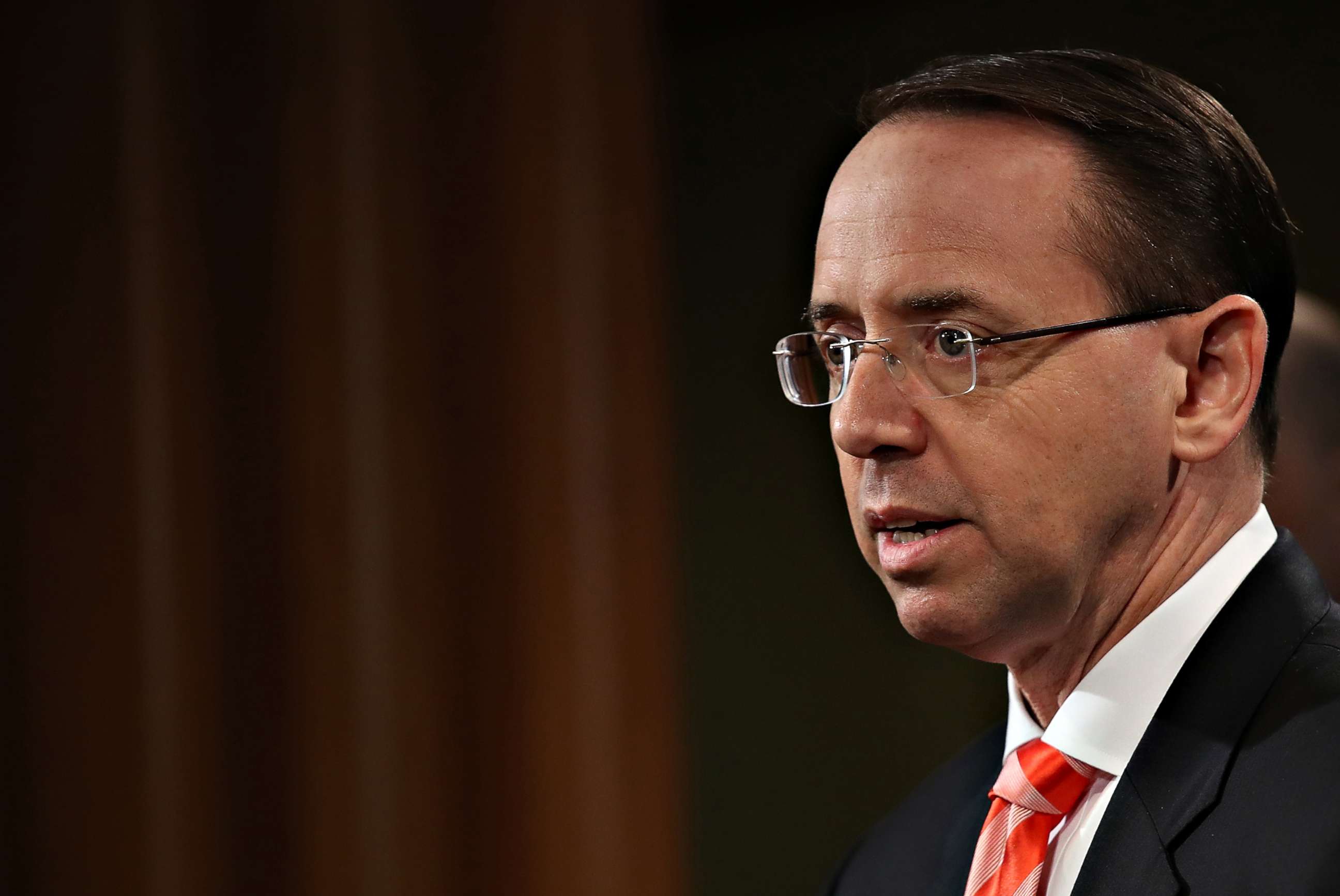 PHOTO: Deputy Attorney General Rod Rosenstein speaks at a press conference at the Department of Justice on March 23, 2018 in Washington, DC.