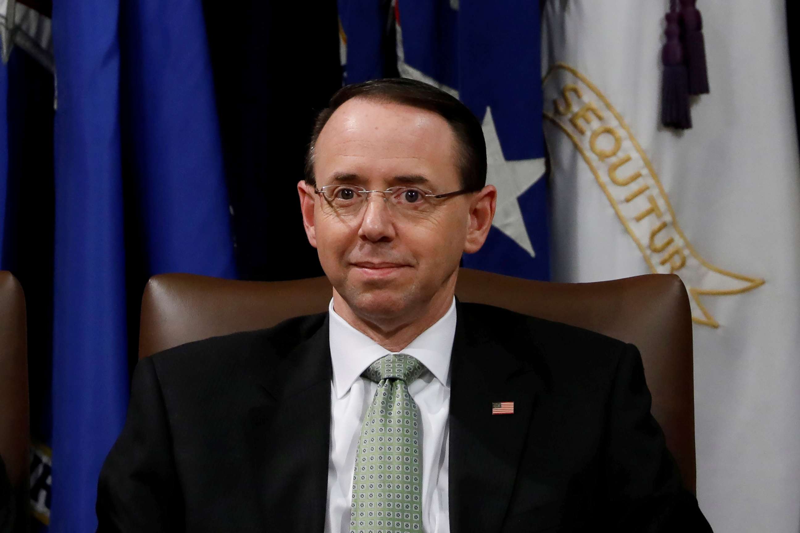 PHOTO: U.S. Deputy Attorney General Rod Rosenstein looks on at a summit about combating human trafficking at the Department of Justice in Washington, D.C., Feb. 2, 2018.