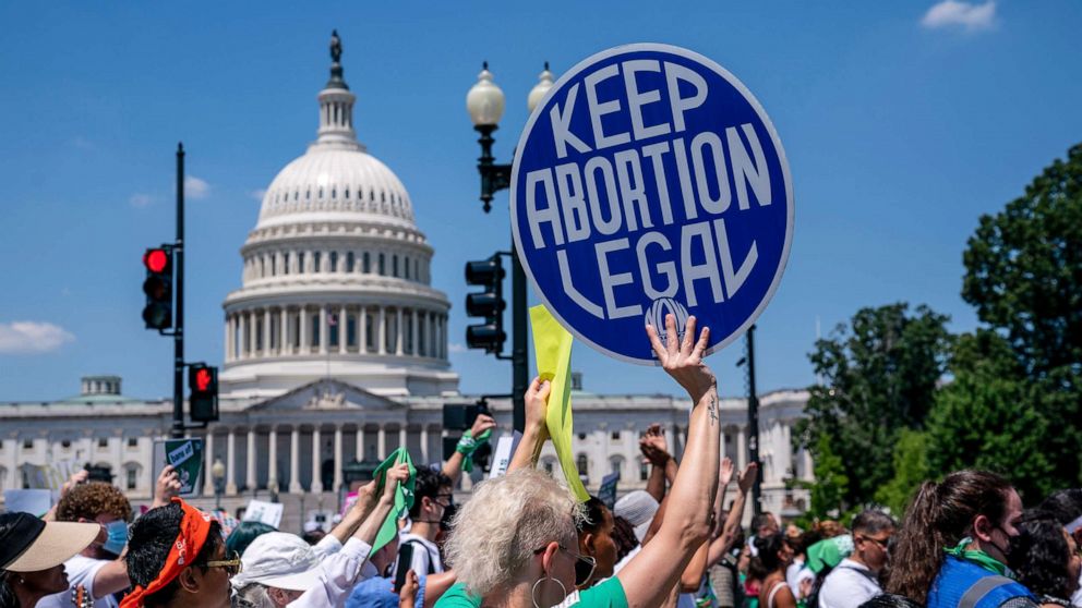 PHOTO: Abortion-rights activists demonstrate against the Supreme Court decision to overturn Roe v. Wade that established a constitutional right to abortion, on Capitol Hill, June 30, 2022. 
