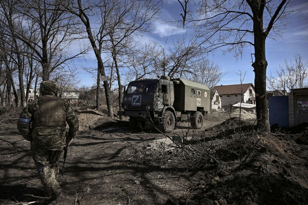 PHOTO: Ukrainian troops drive a captured Russian military vehicle after retaking the village of Mala Rogan, east of Kharkiv, March 28, 2022.