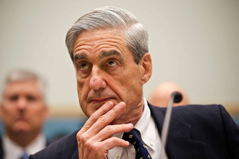 PHOTO: In this June 13, 2012, file photo then-FBI Director Robert Mueller listens as he testifies on Capitol Hill in Washington, D.C.