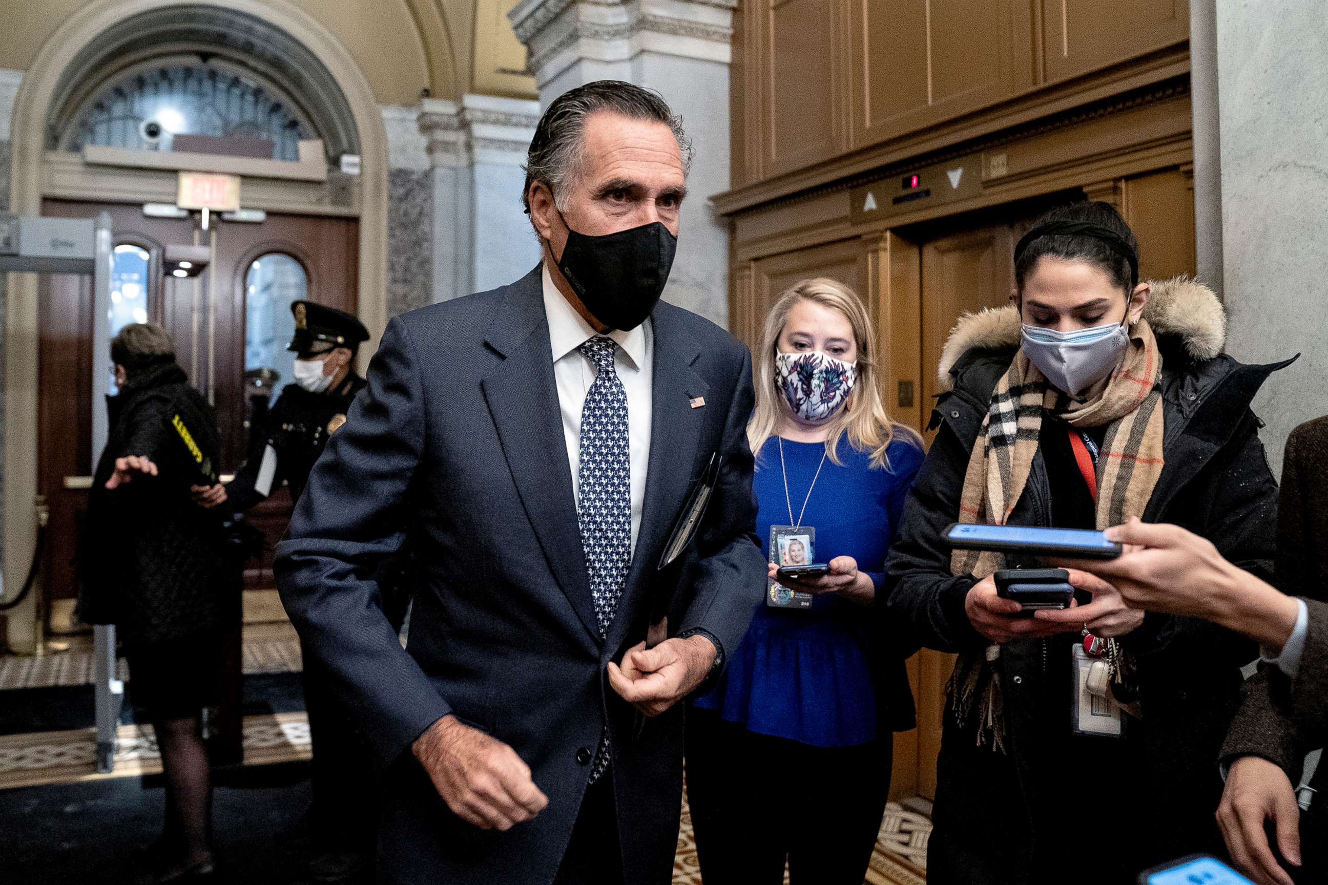 PHOTO: Sen. Mitt Romney speaks to reporters as he arrives on the fifth day of the second impeachment trial of former President Donald Trump, Feb. 13, 2021, at the Capitol in Washington, D.C.