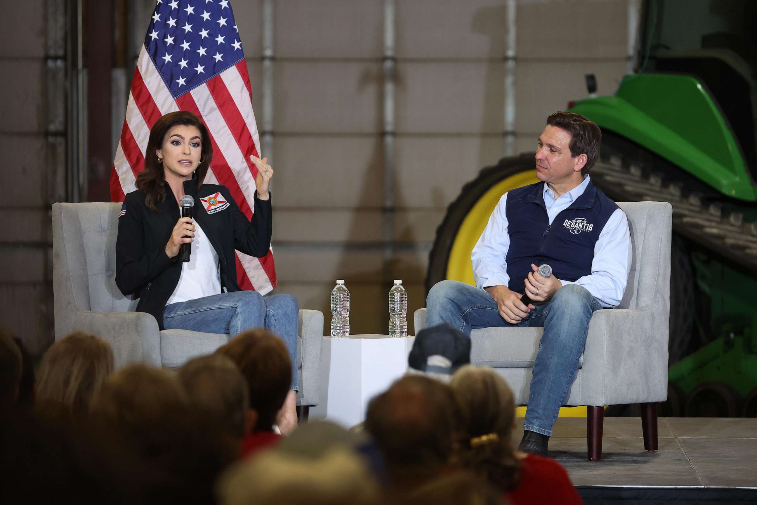 PHOTO: Republican presidential candidate Florida Governor Ron DeSantis listens a his wife Casey speaks during a campaign rally at Port Neal Welding Company, on May 31, 2023, in Salix, Iowa.