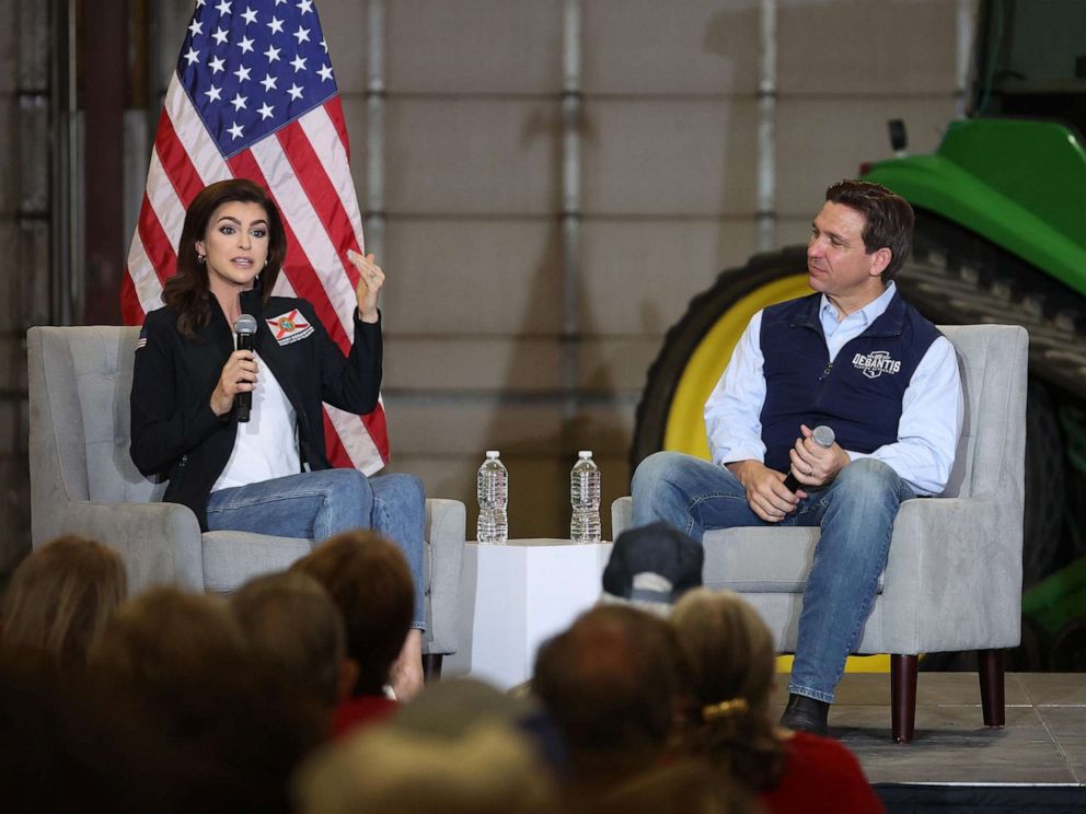 PHOTO: Republican presidential candidate Florida Governor Ron DeSantis listens a his wife Casey speaks during a campaign rally at Port Neal Welding Company, on May 31, 2023, in Salix, Iowa.