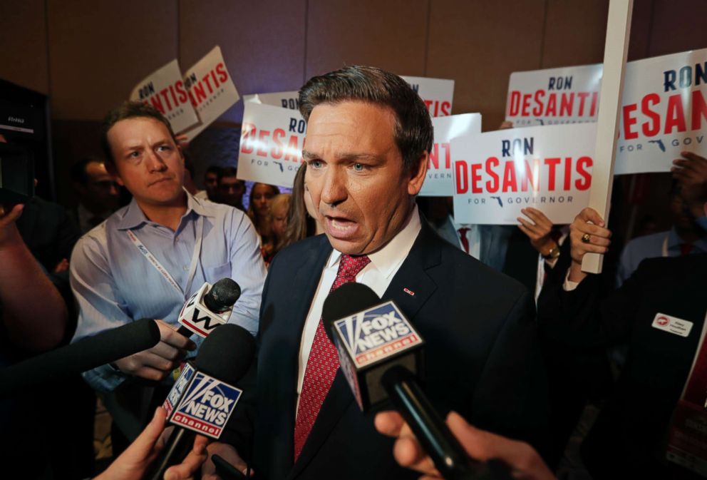 PHOTO: Rep. Ron DeSantis answers questions from reporters after a Florida Republican gubernatorial primary debate at the Republican Sunshine Summit, June 28, 2018, in Kissimmee, Fla.