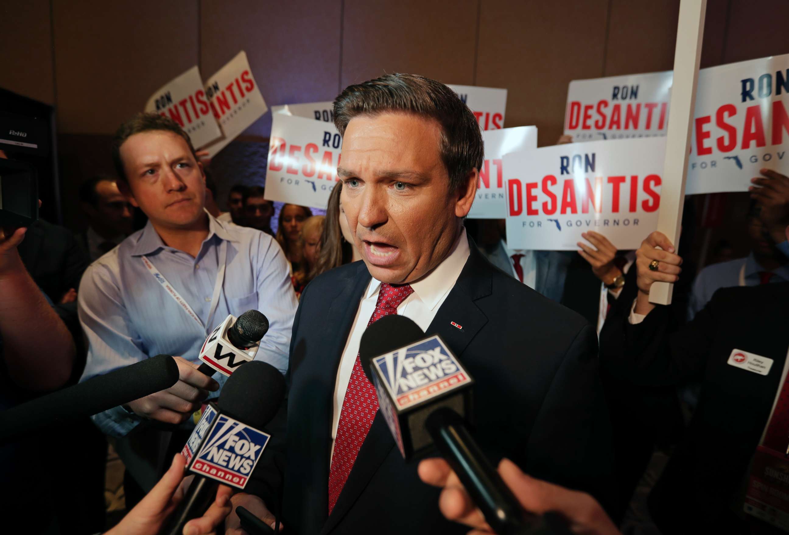 PHOTO: Rep. Rep. Ron DeSantis answers questions from reporters after a Florida Republican gubernatorial primary debate ON June 28, 2018, in Kissimmee, Fla.