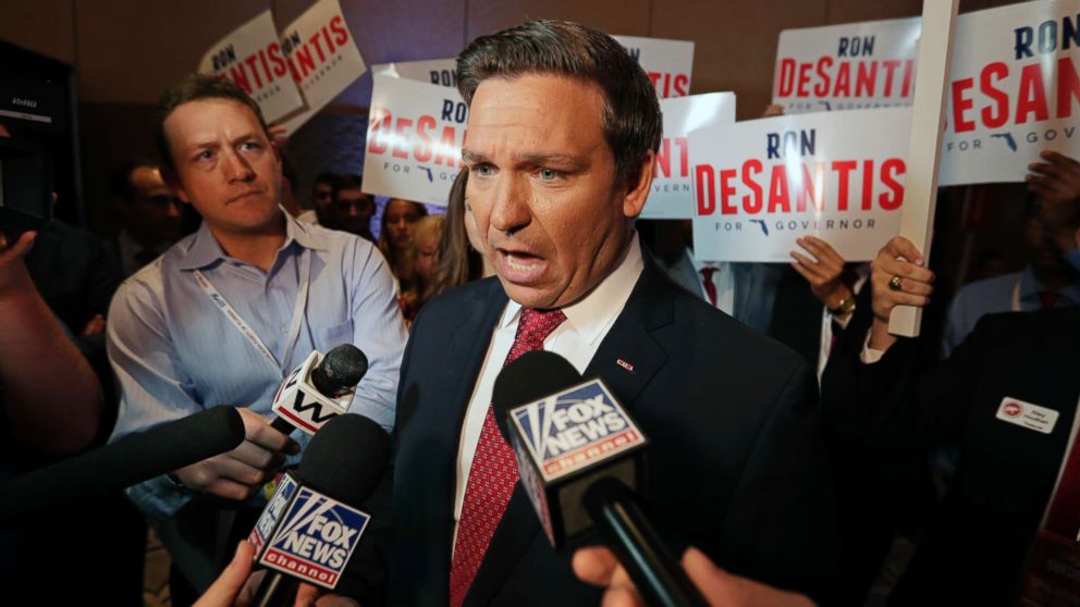 PHOTO: Rep. Rep. Ron DeSantis answers questions from reporters after a Florida Republican gubernatorial primary debate ON June 28, 2018, in Kissimmee, Fla.