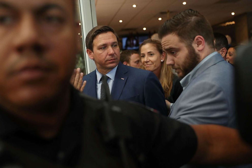 PHOTO: Republican gubernatorial candidate Ron DeSantis attends a campaign rally at Mo's Bagels restaurant on Oct. 23, 2018 in Miami.