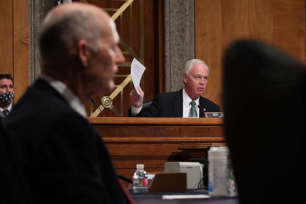 PHOTO: Senate Homeland Security Committee Chairman Ron Johnson (R-WI) holds up a timeline during a hearing about the Crossfire Hurricane investigation in the Dirksen Senate Office Building on Capitol Hill, Dec. 3, 2020.