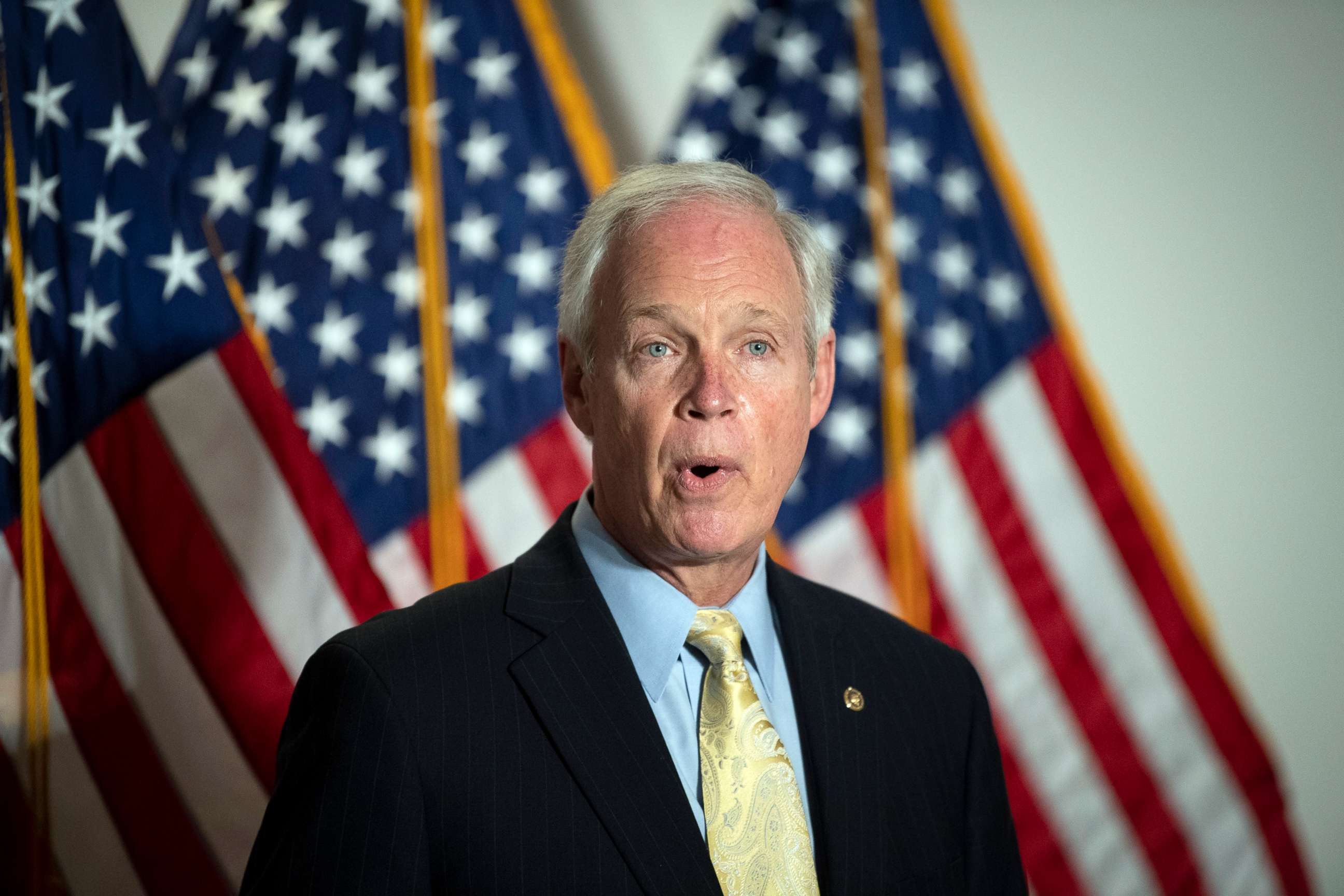 PHOTO: Sen. Ron Johnson talks with members of the press in the Hart Building in Washington, Jan. 26, 2021.