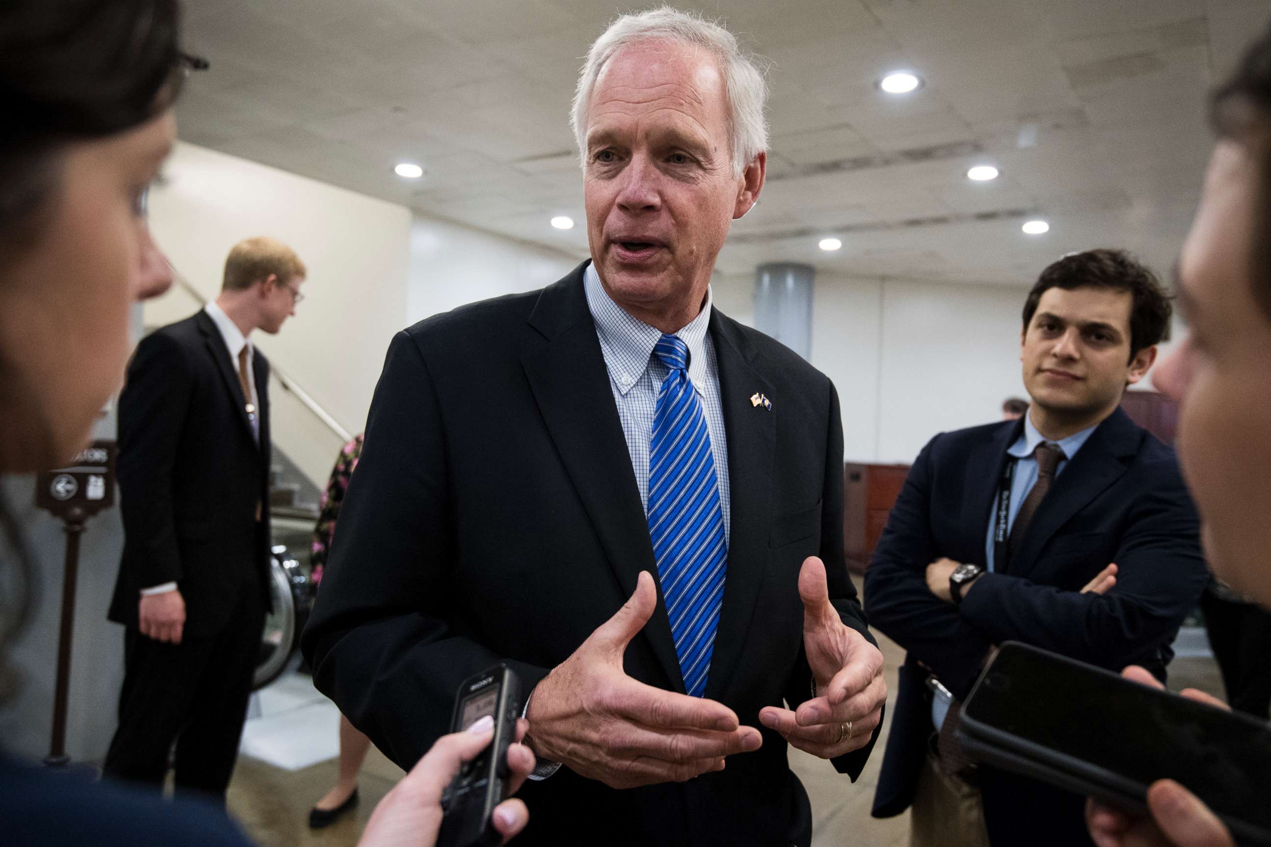 PHOTO: Sen. Ron Johnson speaks with reporters in the Capitol, May 17, 2018.