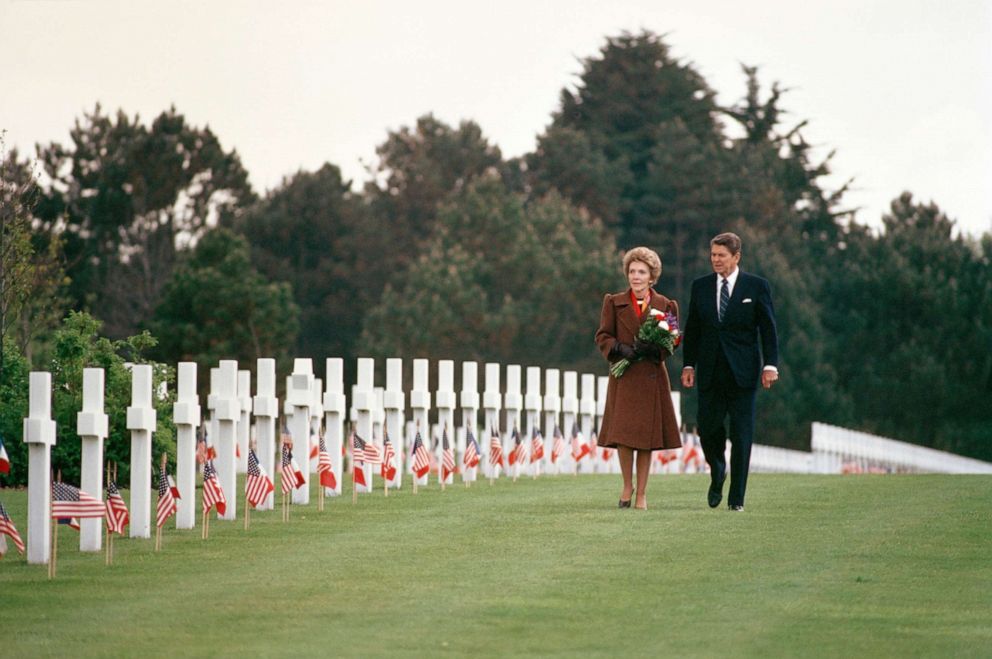 PHOTO: President Ronald Reagan and first lady Nancy Reagan walk among the crosses of the Normandy American Cemetery June 6, 1984 in Normandy, France.