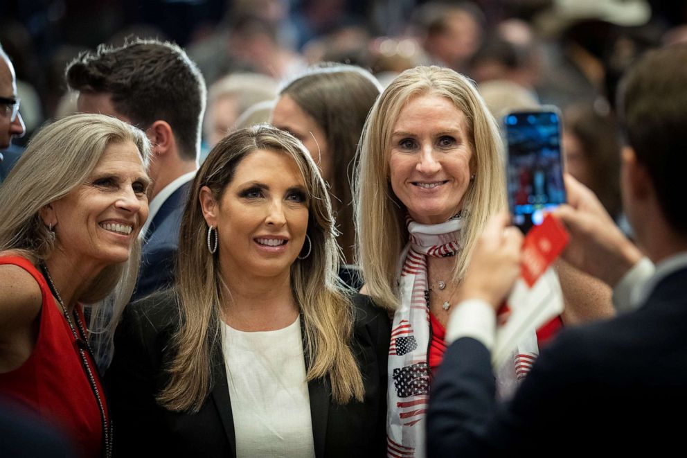 PHOTO: Chair of the Republican National Committee Ronna McDaniel (C) takes pictures with guests during the America First Agenda Summit, at the Marriott Marquis Hotel, on July 26, 2022, in Washington, D.C.