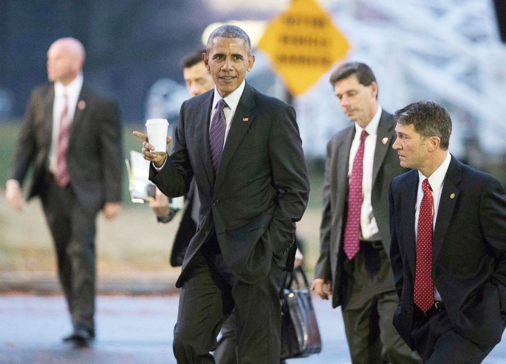 PHOTO: President Barack Obama walks with his physician Ronny Jackson, right, towards a waiting Marine One as he leaves Walter Reed National Military Medical Center in Bethesda, Md., after visiting wounded service members,, Nov. 29, 2016.