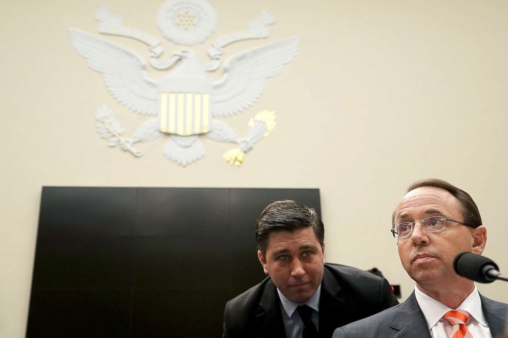 PHOTO: Assistant Attorney General Stephen Boyd, left, looks over the shoulder of Deputy Attorney General Rod Rosenstein during a hearing before the House Judiciary Committee, June 28, 2018, on Capitol Hill in Washington, DC.