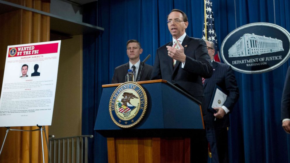 Deputy Attorney General Rod Rosenstein speaks during a news conference announcing the indictment against international computer hackers at the Department of Justice in Washington, Nov. 28, 2018.
