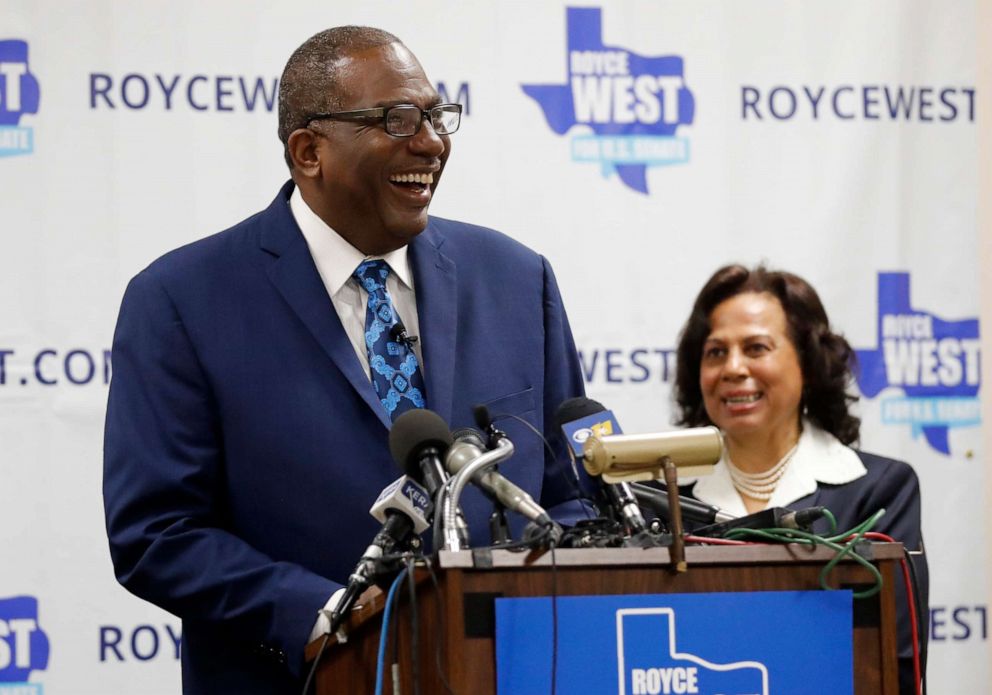 PHOTO: State Senator Royce West smiles as his wife Carol, right rear, looks on during a rally where West announced his bid to run for the US Senate in Dallas, Monday, July 22, 2019.