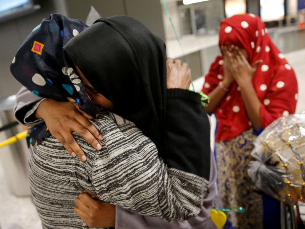 PHOTO: Roodo Abdishakur (2nd L), a Somali national who was delayed entry to the U.S. because of the recent travel ban, is greeted by her mother Zahra Warsma (L) at Washington Dulles International Airport in Chantilly, Va., Feb. 6, 2017.