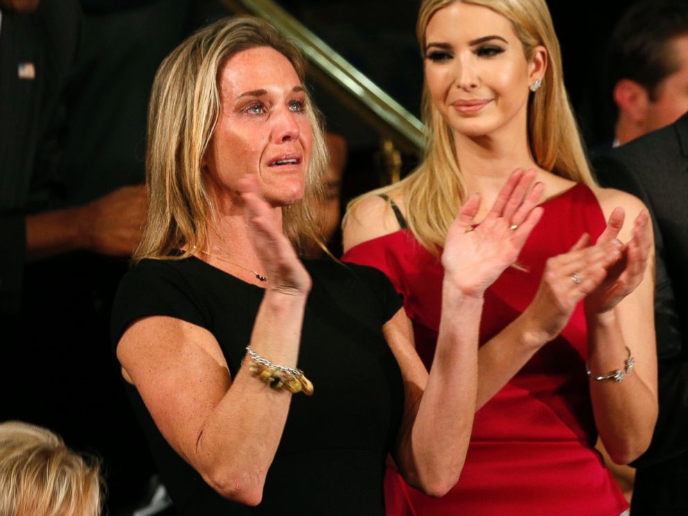PHOTO: Carryn Owens, widow of Senior Chief Petty Officer William Ryan Owens, applauds after being mentioned by President Trump during his address to a joint session of the U.S. Congress on Feb. 28, 2017 in Washington, DC.
