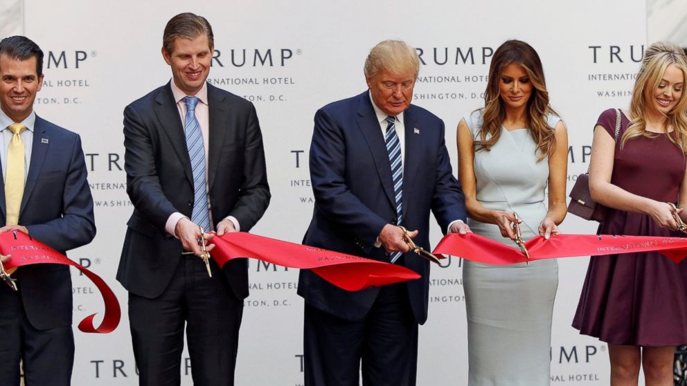 Donald Trump Jr., Eric Trump, Republican presidential nominee Donald Trump, Melania Trump, Tiffany Trump and Ivanka Trump attend an official ribbon cutting ceremony at the new Trump International Hotel in Washington, Oct. 26, 2016.